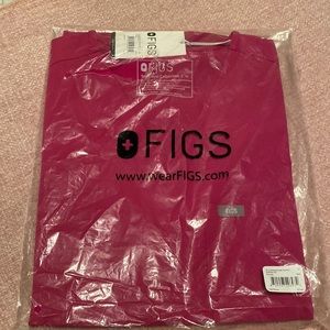 New Figs top.  HOT pink in color. Never removed from the bag.